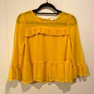 Cupcakes and Cashmere ruffle peplum marigold blouse. Size small.